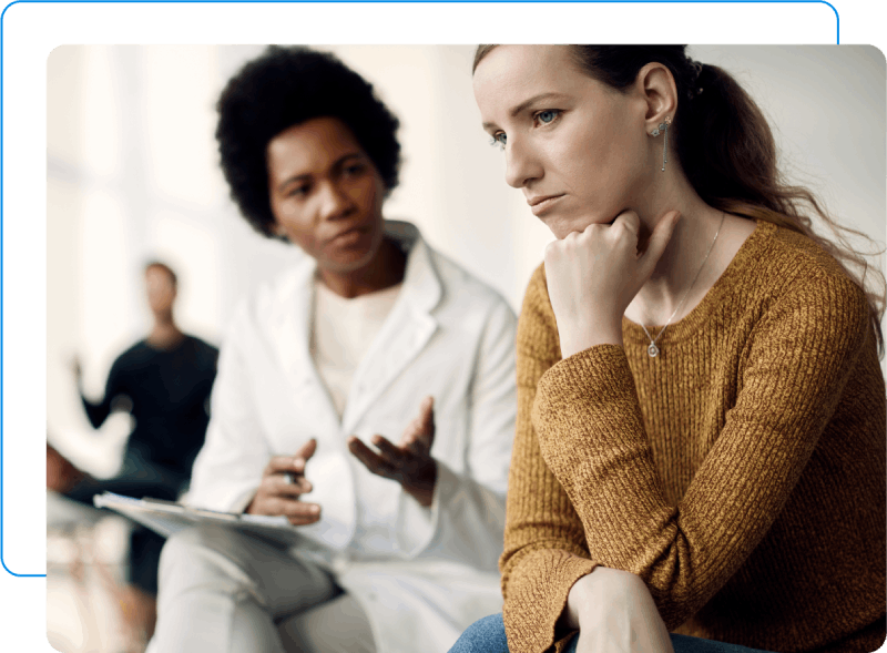 Woman with health anxiety talking to a medical anxiety therapist.