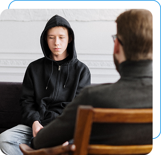 A man talking to a therapist in an anxiety counselling session in Calgary.